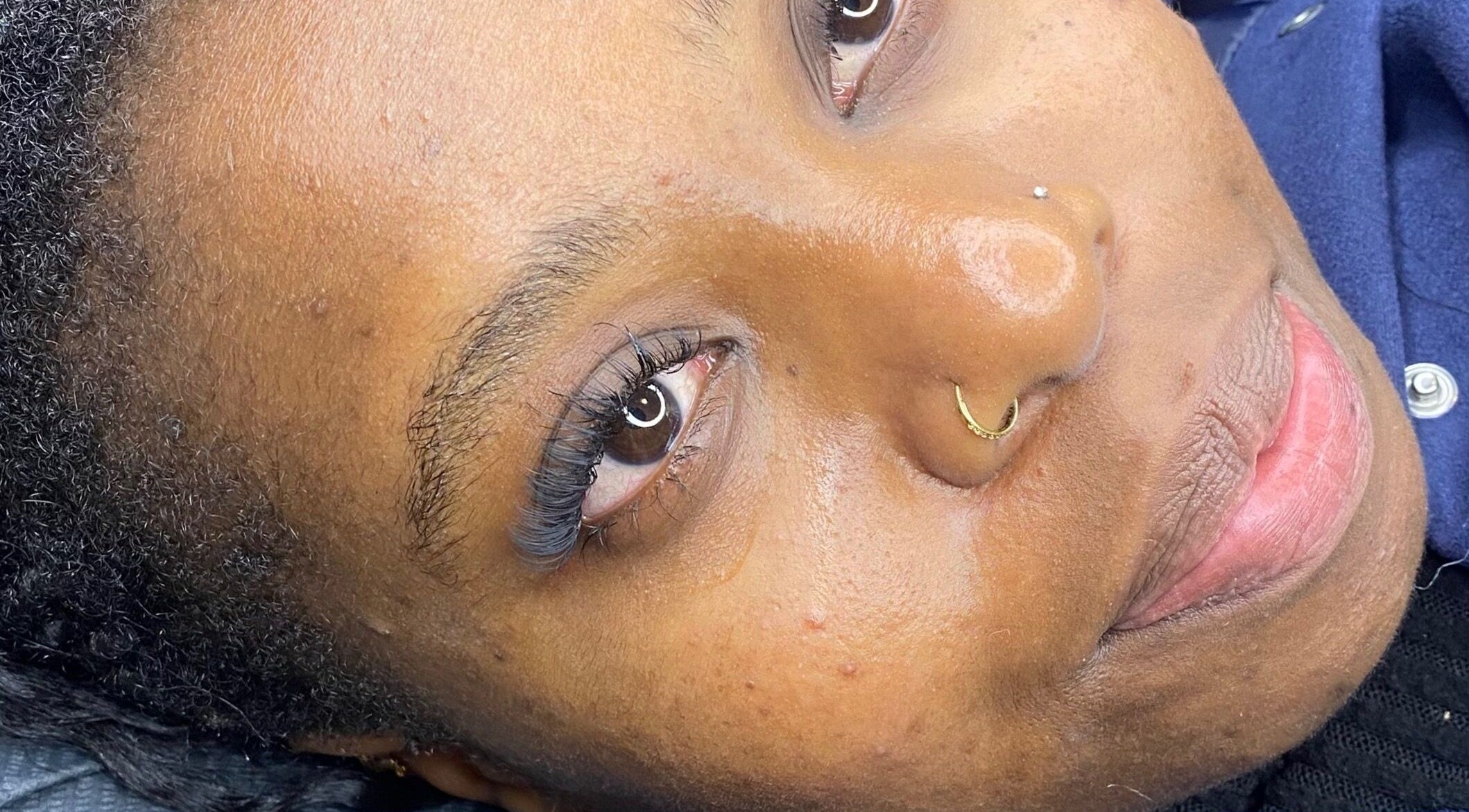 Close-up of a woman with elegant eyelashes at The Scorpio Effect, Auckland, Auckland, NZ.