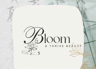 Elegant logo of Bloom & Thrive Beauty, Parys, Free State, ZA, featuring a lotus design.