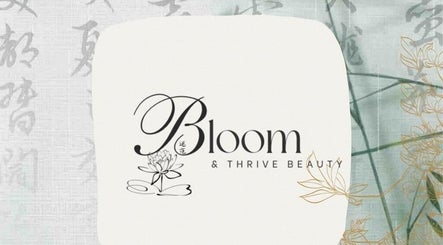 Elegant logo of Bloom & Thrive Beauty, Parys, Free State, ZA, featuring a lotus design.