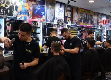 Stylists at Moe & Co West Gosford refining hairstyles, West Gosford, New South Wales, AU.