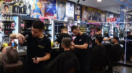 Stylists at Moe & Co West Gosford refining hairstyles, West Gosford, New South Wales, AU.