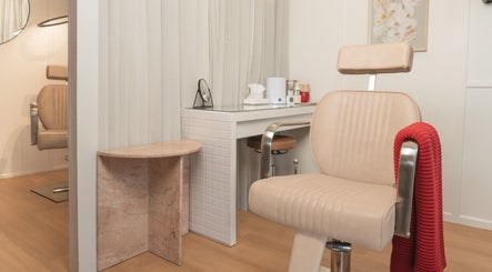 Cozy beauty station at Finish Beauty, Paddington, Queensland, AU with plush chairs and modern decor.