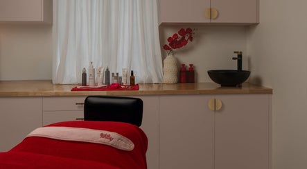 Finish Beauty treatment room in Paddington, Queensland, AU, featuring products and sleek decor.