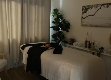 Relaxing spa room at ManUnwind - The Man Spa in Little Mountain, Queensland, AU, offering serene ambiance.