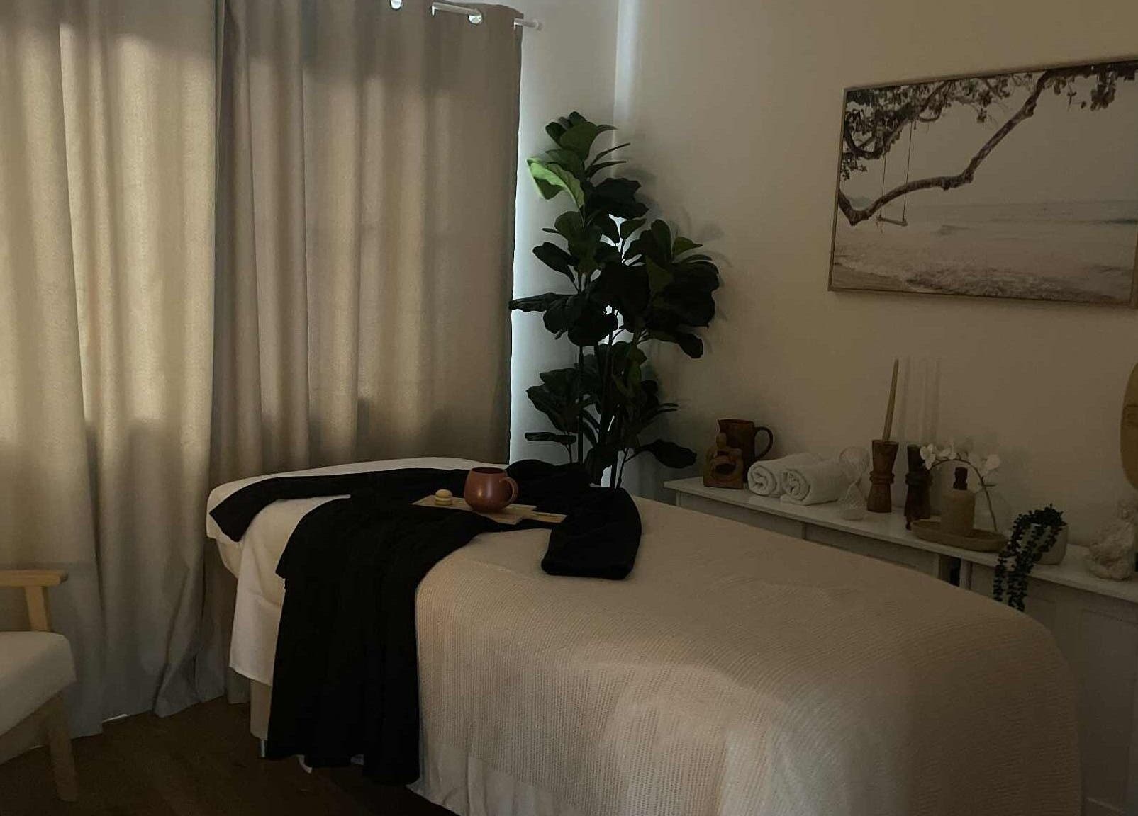 Relaxing massage room at Viktor - Men's Grooming Lounge, Little Mountain, Queensland, AU features plush decor.