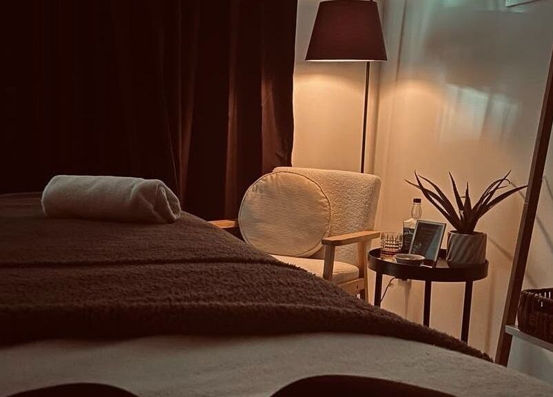 Relaxing massage room at Viktor - Men's Grooming Lounge in Little Mountain, Queensland, AU with cozy chair.