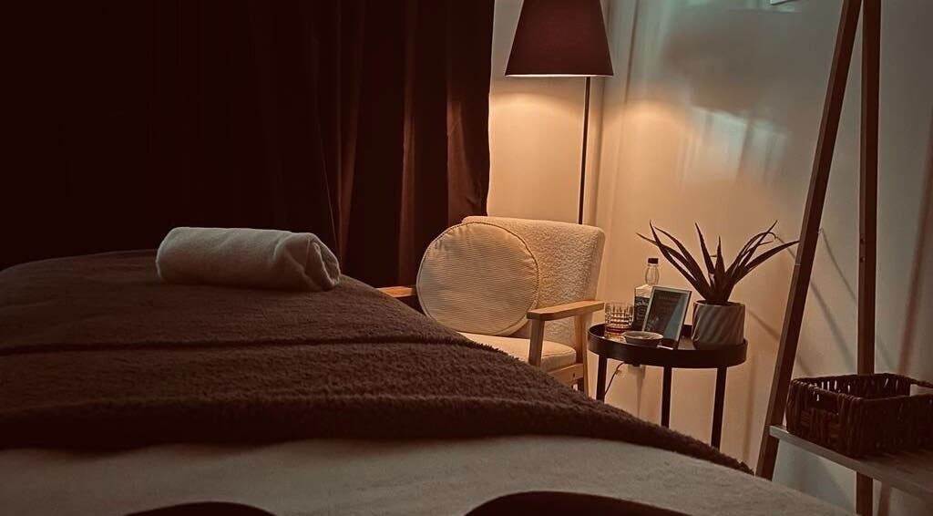 Relaxing massage room at Viktor - Men's Grooming Lounge in Little Mountain, Queensland, AU with cozy chair.