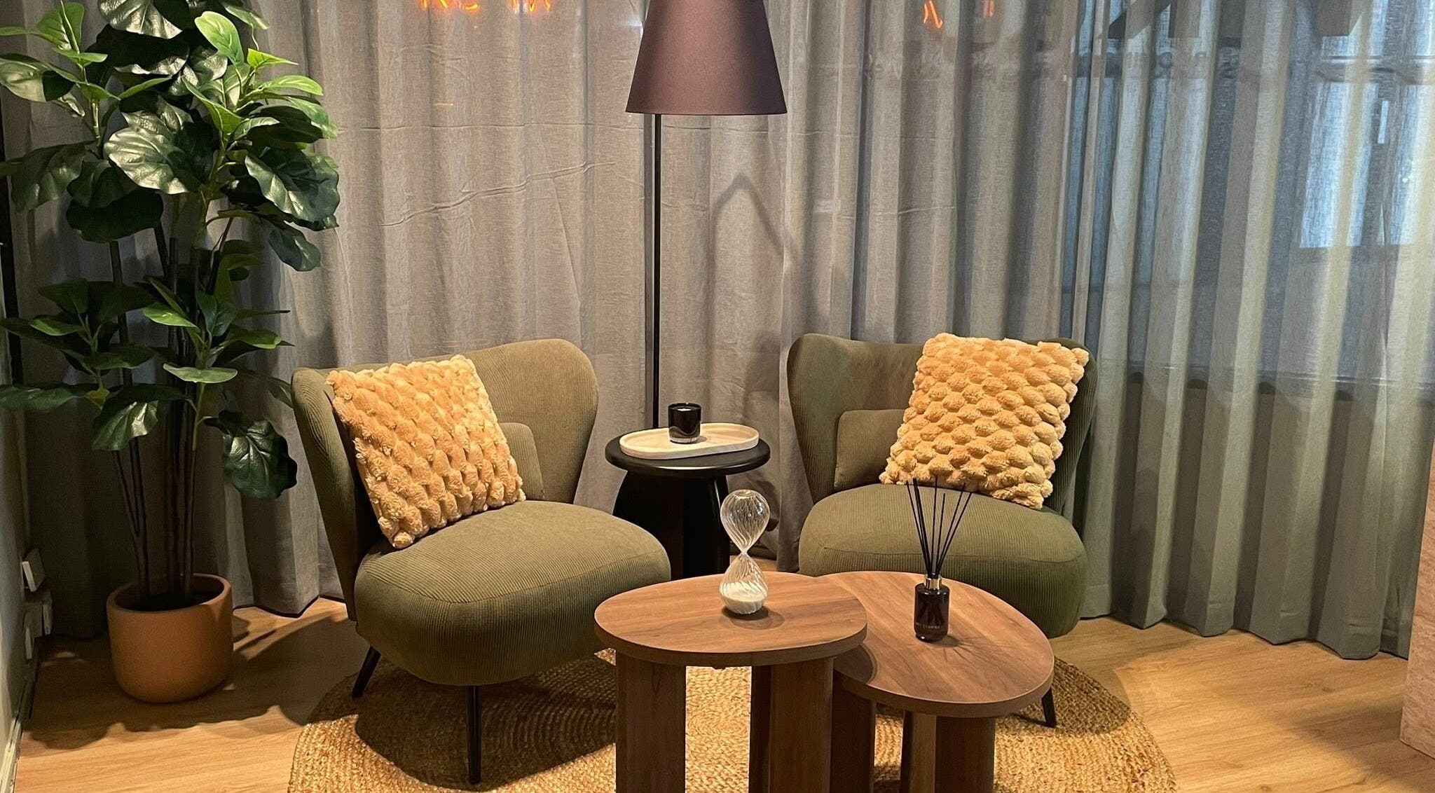 Cozy seating area at Viktor - Men's Grooming Lounge, Caloundra, Queensland, AU, perfect for relaxation.