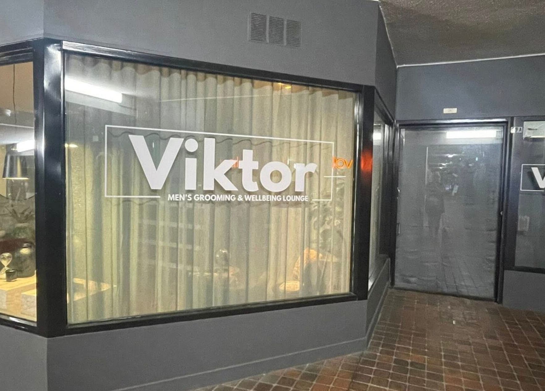 Viktor - Men's Grooming Lounge entrance in Caloundra, Queensland, AU, showcasing modern design and style.