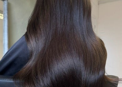Glossy, straight dark hair at Studio Shade Wlv, Wolverhampton, England, GB.