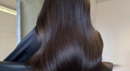 Glossy, straight dark hair at Studio Shade Wlv, Wolverhampton, England, GB.