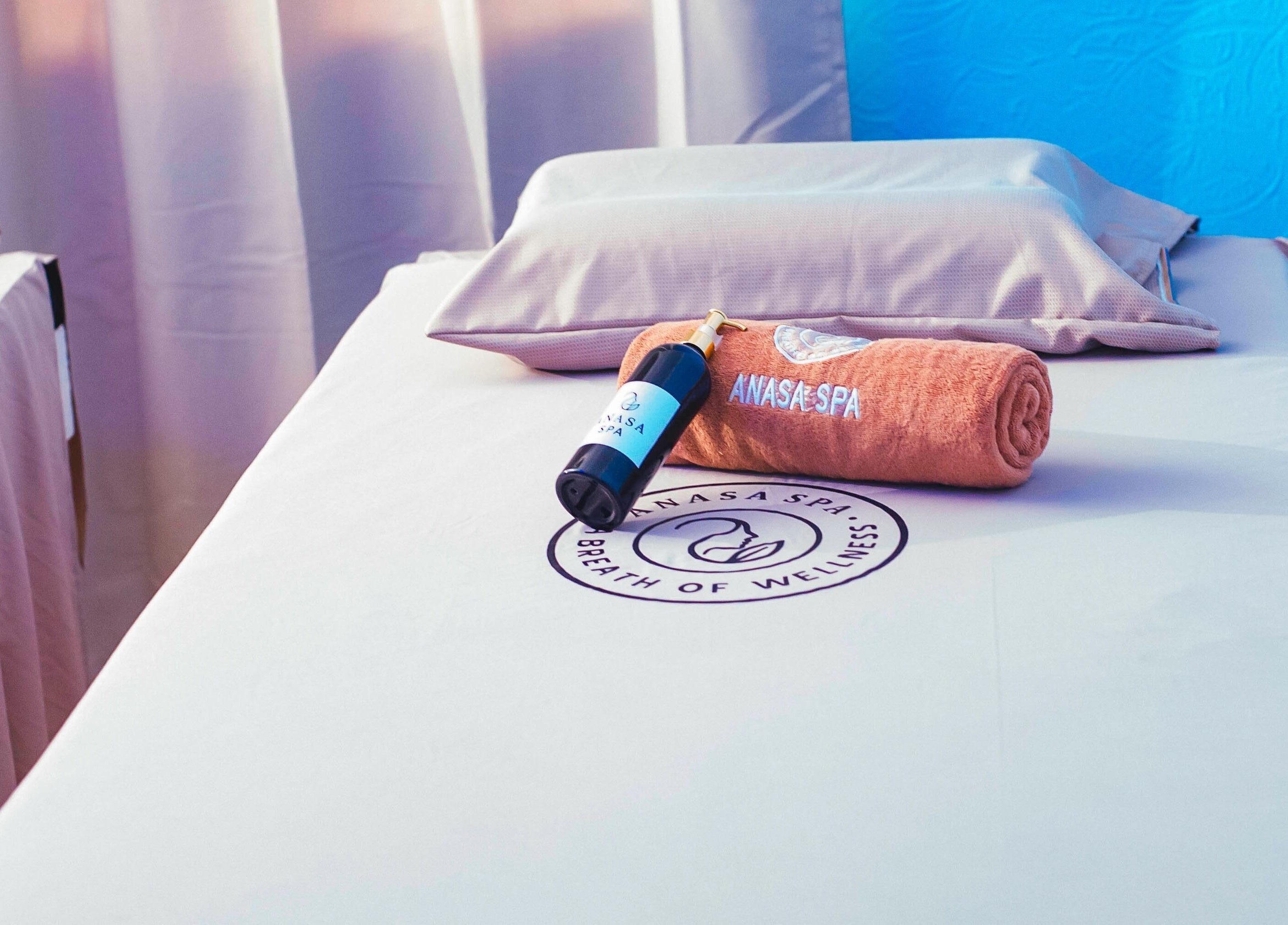 Relaxing treatment table at Anasa Spa & Wellness in Ogbodjo, Greater Accra Region, GH, with cozy towels.