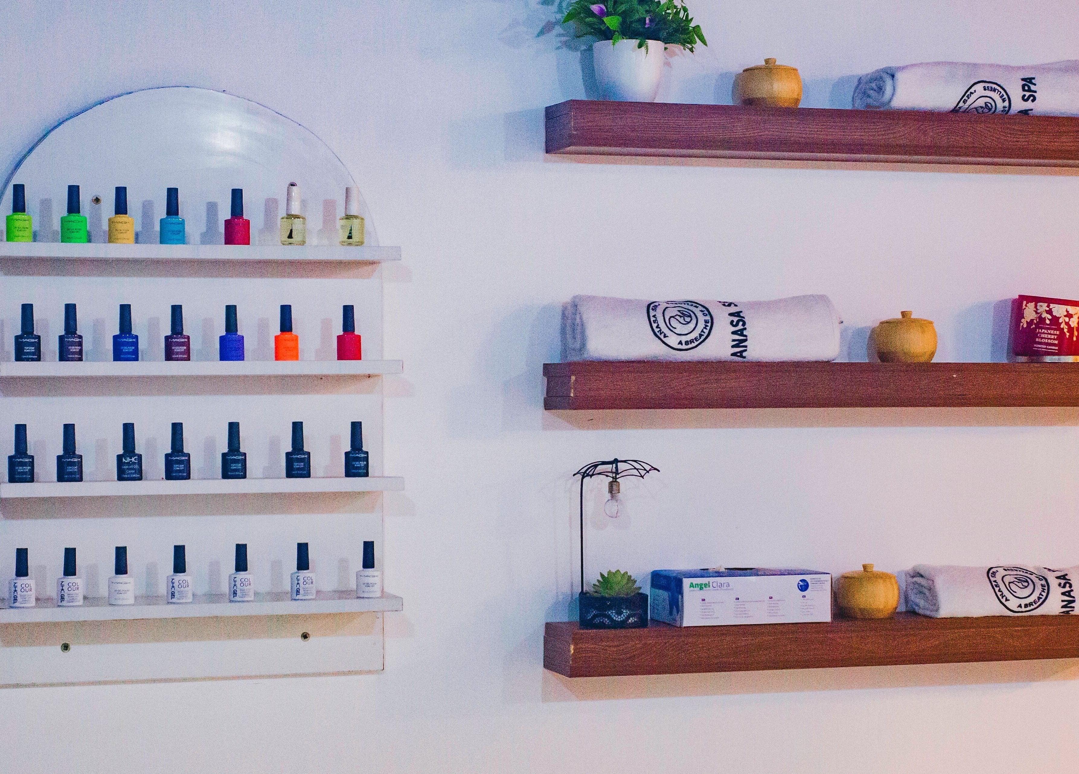 Nail polish display at Anasa Spa & Wellness, Ogbodjo, Greater Accra Region, GH. Relaxing ambiance and elegant decor.