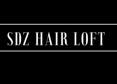 Elegant SDZ Hair Loft signage in Dublin, Ohio, US. Chic black and white design enhances brand identity.