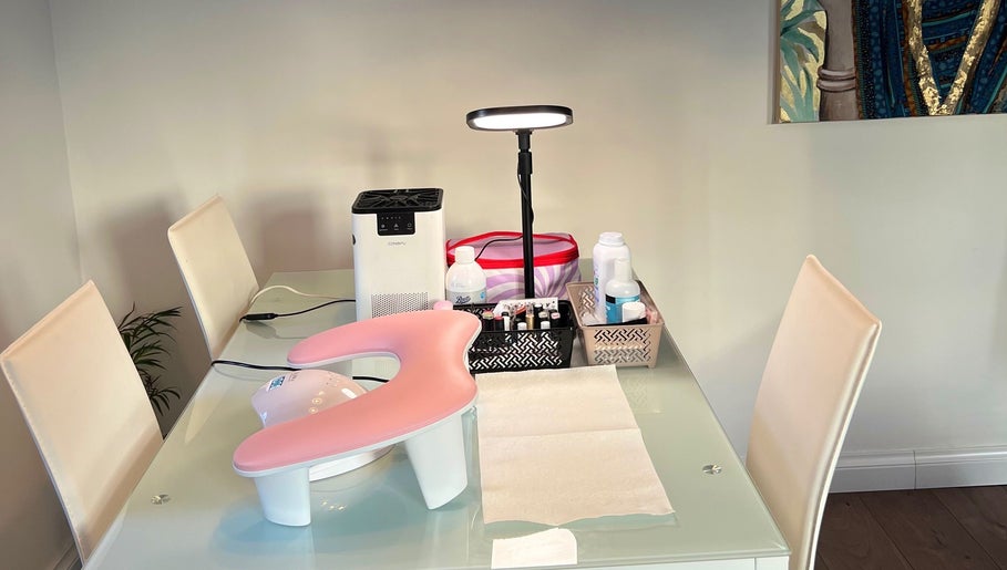 Nail station at Balkan Glam Nails, London, England, GB showcasing manicure tools and decor.
