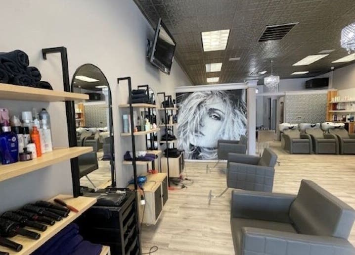 On the Avenue Salon in Norwalk, Connecticut showcases elegant seating and modern decor for a luxurious experience.