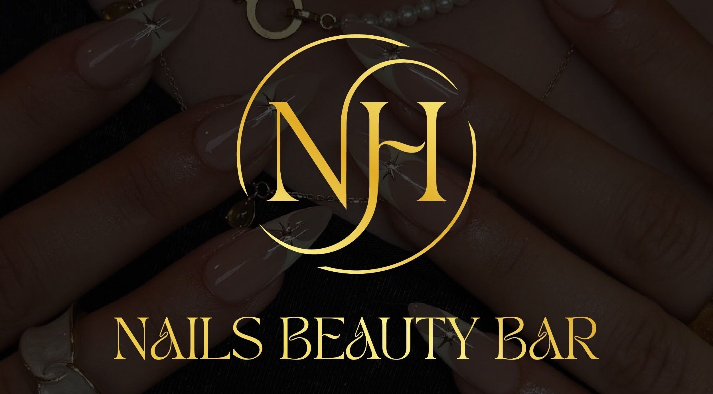 NH NAILS BEAUTY BAR logo over stylish nails in Rosebery, New South Wales, AU.