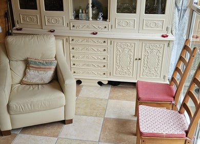 Comfortable armchair and wooden chairs in a serene corner at Apple Blossom Holistic Therapies, Bournemouth, England, GB.