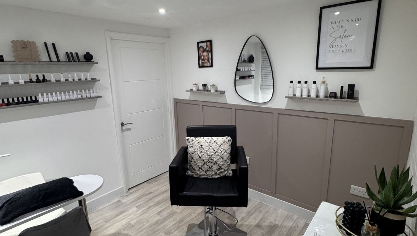 Stylish interior of Studio.19 in Ixworth, England, GB, featuring elegant furnishings and beauty products.
