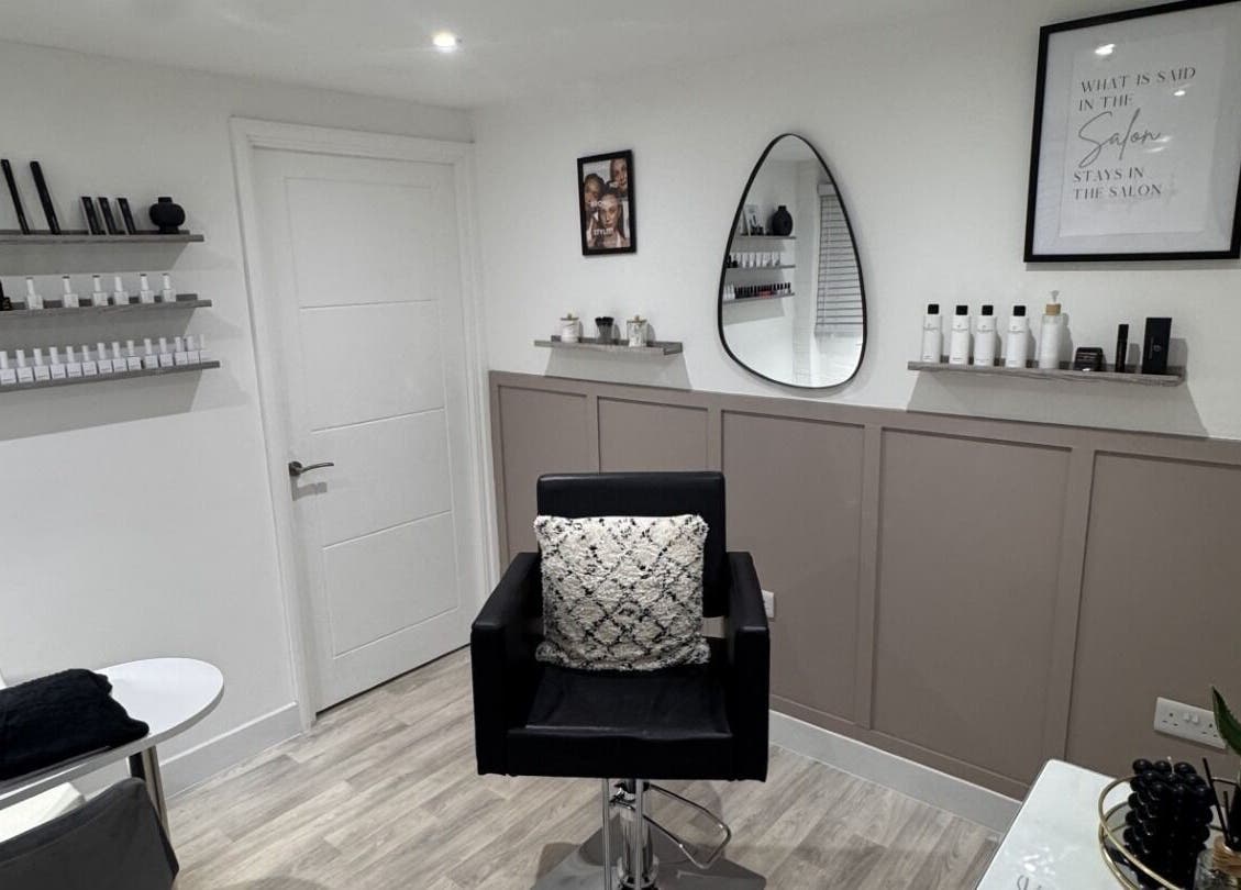 Stylish interior of Studio.19 in Ixworth, England, GB, featuring elegant furnishings and beauty products.