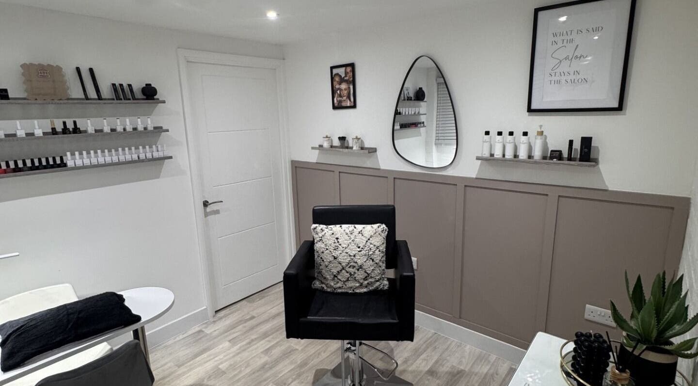 Stylish interior of Studio.19 in Ixworth, England, GB, featuring elegant furnishings and beauty products.