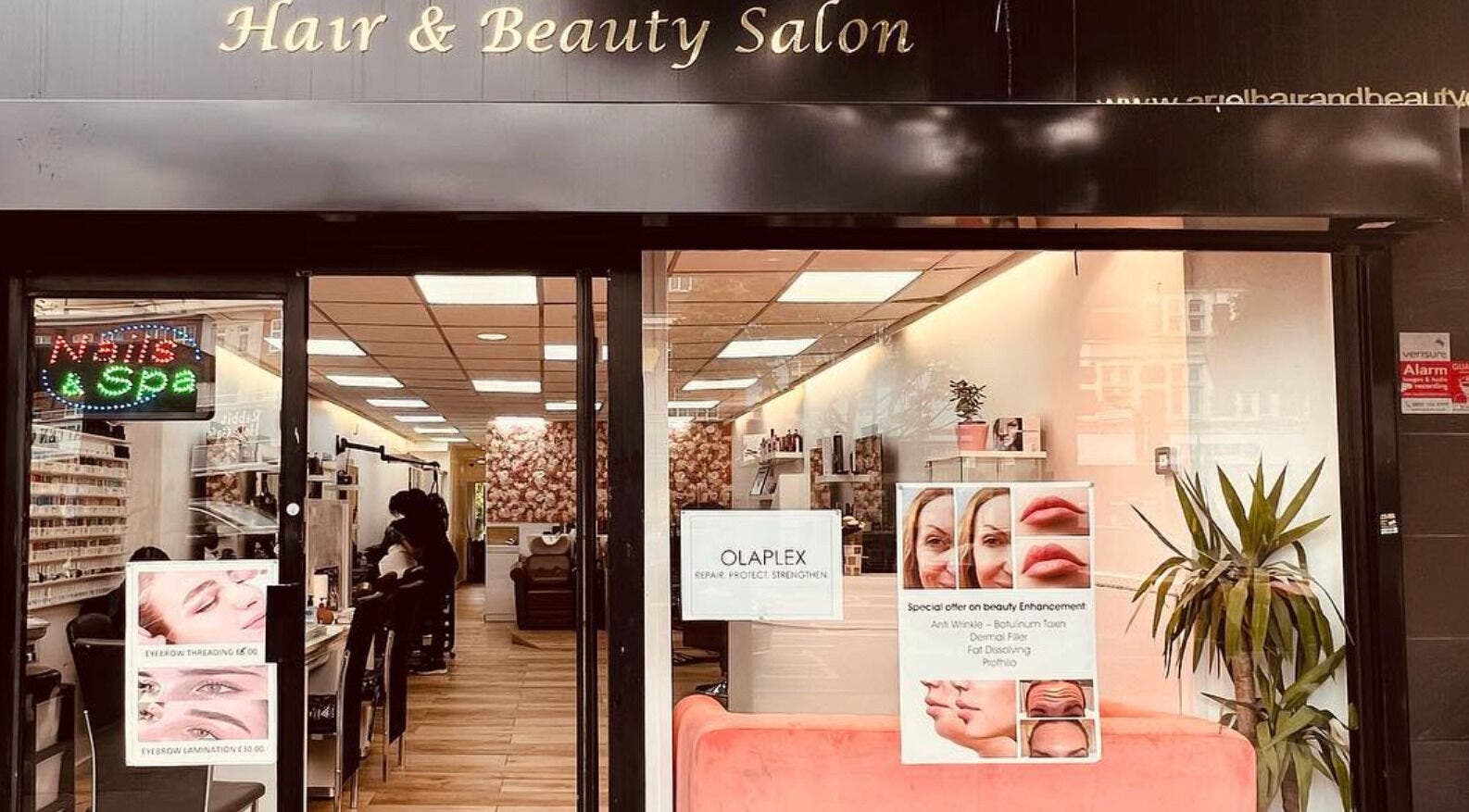 Front of Ariel Hair & Beauty in London, England, GB, showcasing a stylish salon entrance.