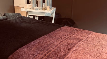 Relaxation room at Ashby Woulds Beauty, Overseal, England, GB with comfortable massage table.