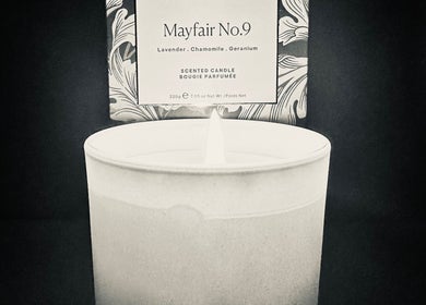 Scented candle lit at Ashby Woulds Beauty in Overseal, England, GB, creating a relaxing ambiance.