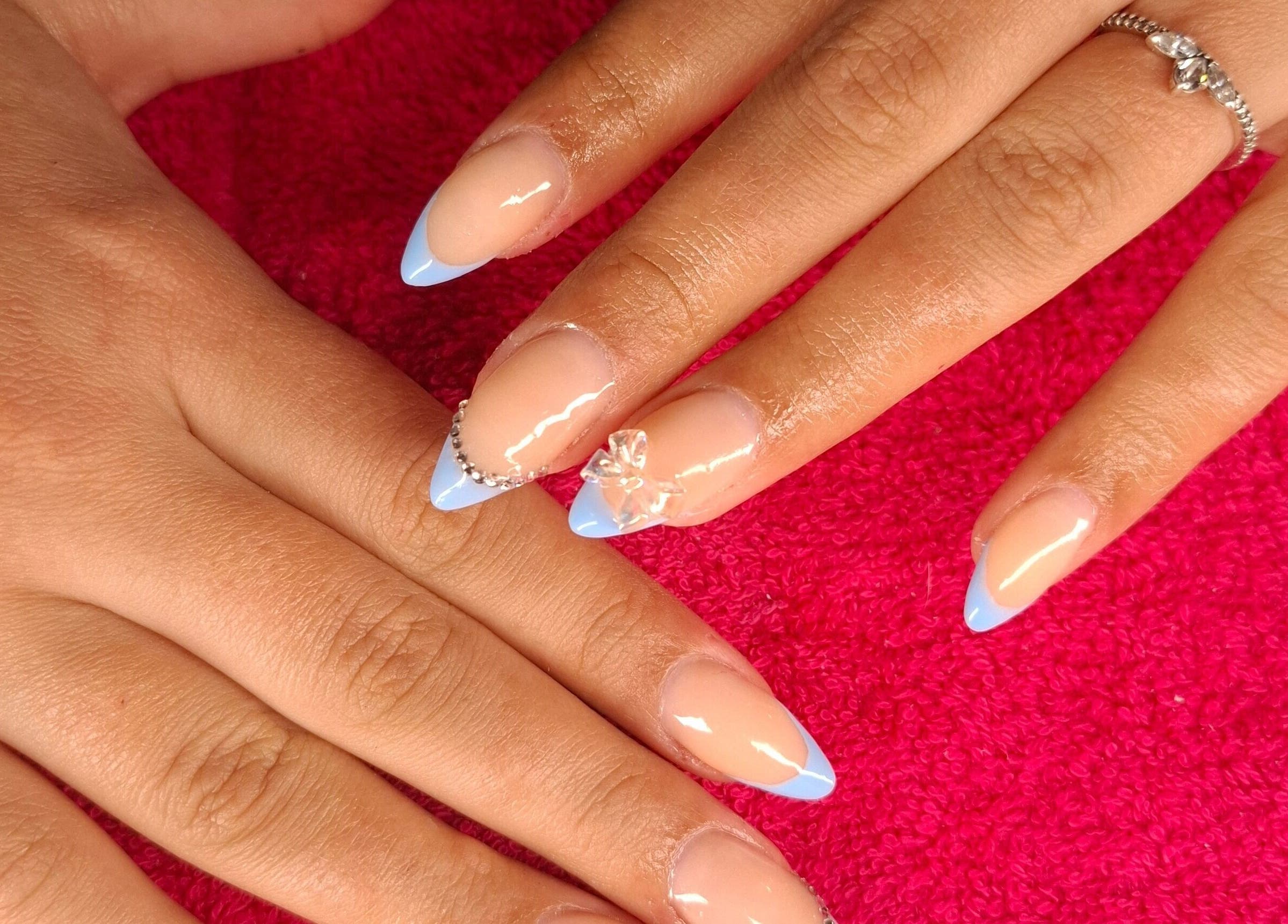Manicured nails with blue tips at Boss Babes Beauty Lounge, Cape Town, Western Cape, ZA.