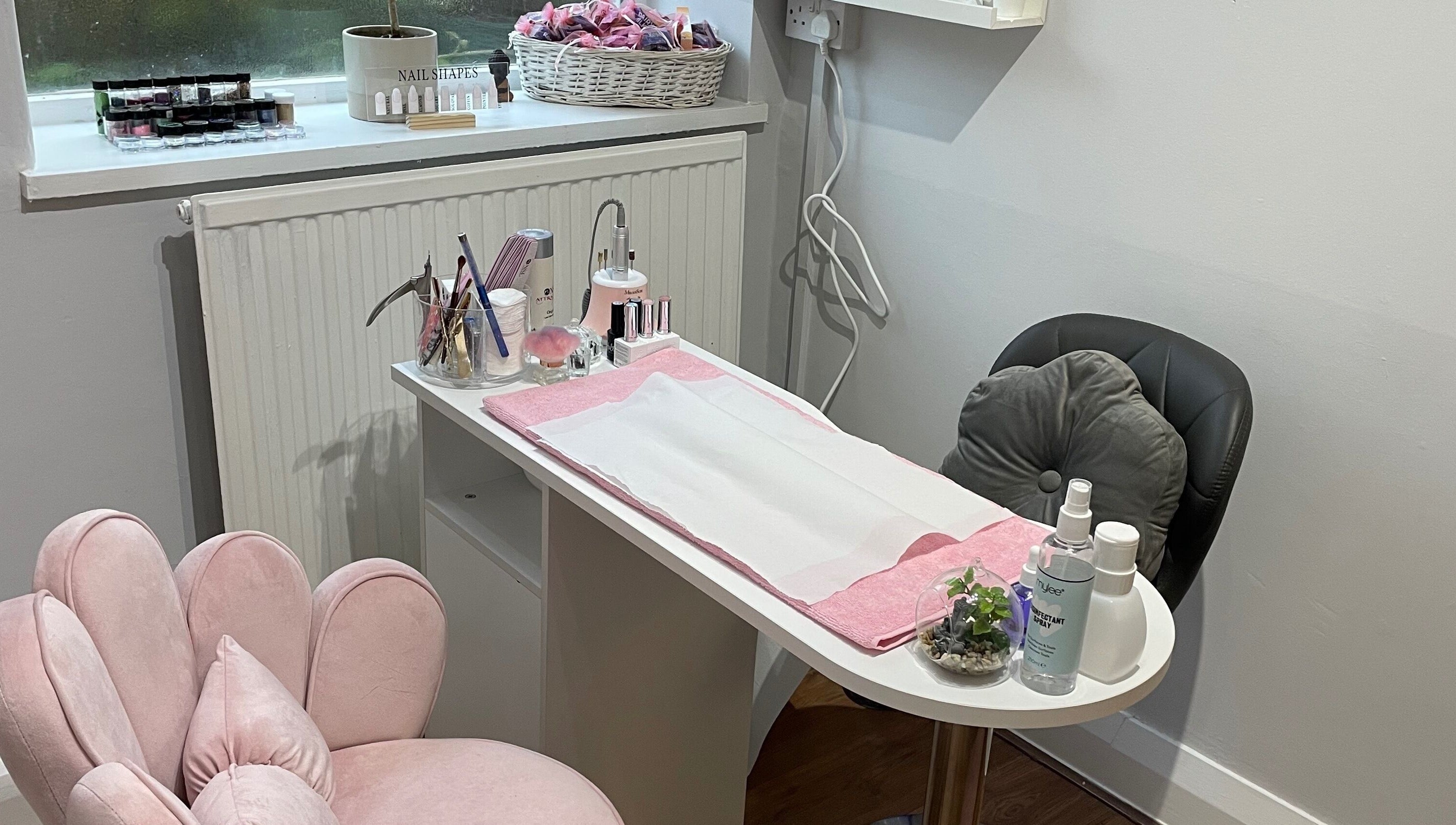 Cozy nail station at Nails by Kate Kennedy in Huddersfield, England, GB, featuring elegant pink decor.