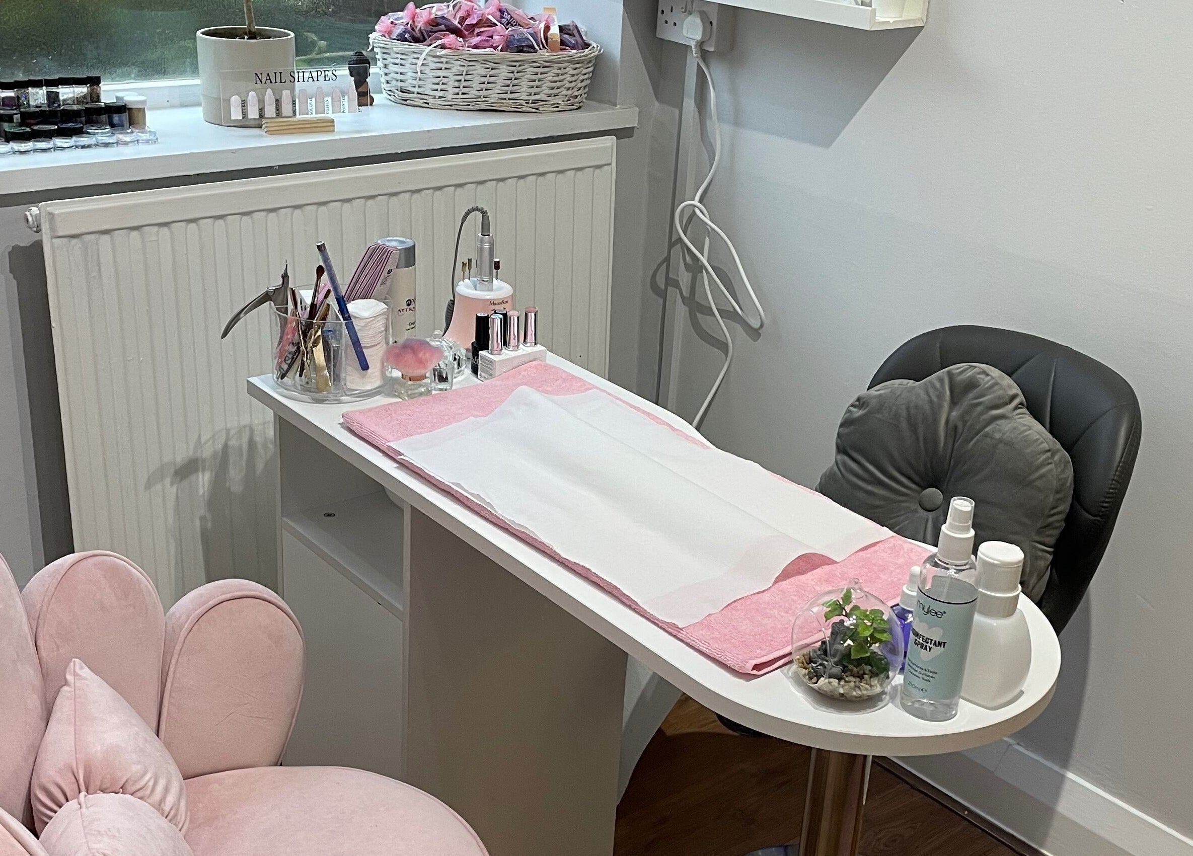 Cozy nail station at Nails by Kate Kennedy in Huddersfield, England, GB, featuring elegant pink decor.
