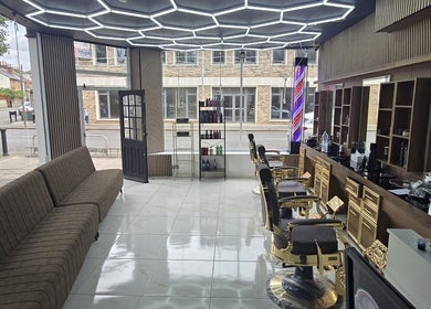 Spacious interior of Sextonbarber(Turkish style) in Kingston Upon Thames, England, featuring modern decor.
