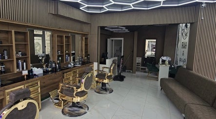 Elegant interior of Sextonbarber(Turkish style) in Kingston Upon Thames, England, GB featuring ornate chairs.