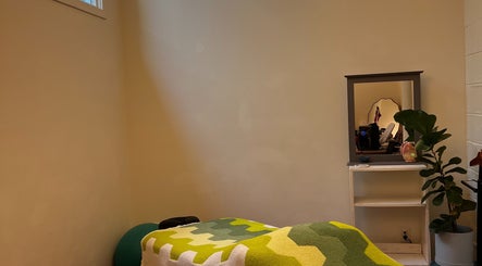 Relaxing massage room at Christine Gonzalez Massage at Studio IX, Charlottesville, Virginia, US.