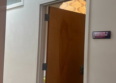 Doorway to Christine Gonzalez Massage at Studio IX in Charlottesville, Virginia, US, showcasing a serene entrance.