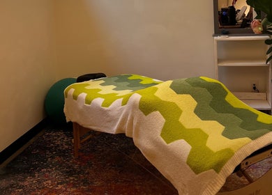 Tranquil massage room at Christine Gonzalez Massage at Studio IX, Charlottesville, Virginia, US.