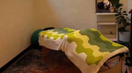 Tranquil massage room at Christine Gonzalez Massage at Studio IX, Charlottesville, Virginia, US.