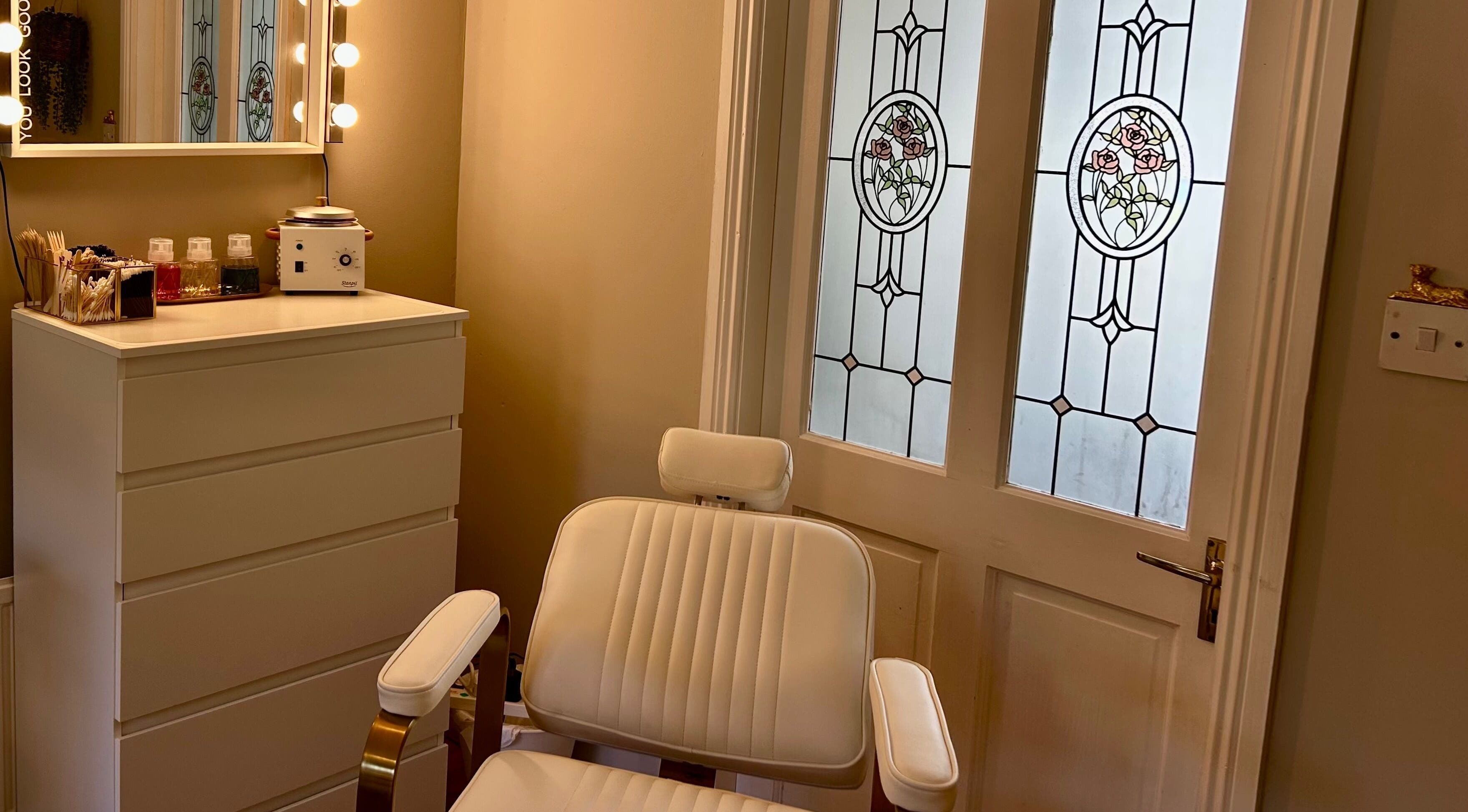 Chic beauty corner at Studio 25 by Sadhbh in Banagher, County Offaly, IE, featuring a stylish chair and vanity.