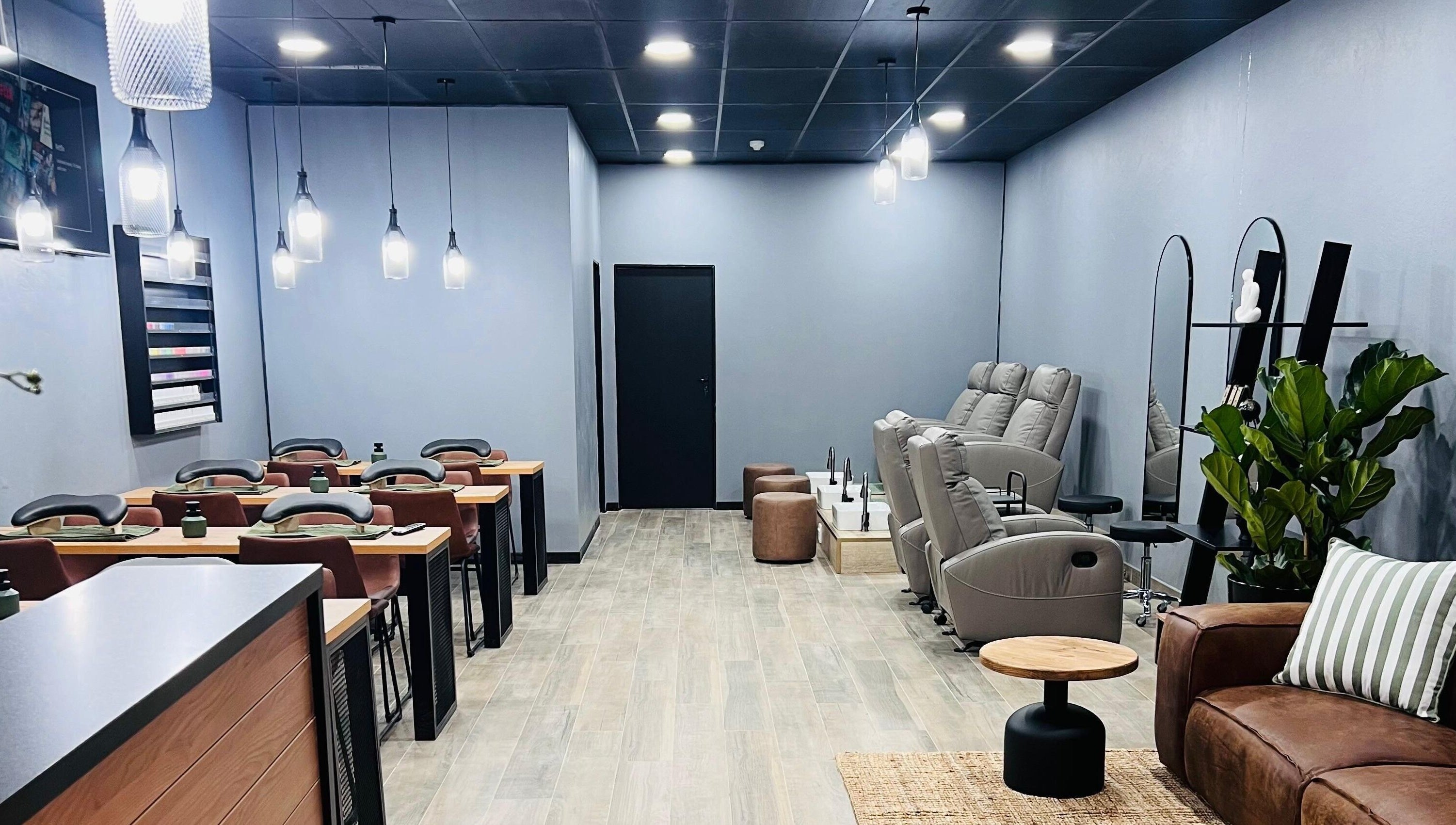 Modern nail salon chairs and tables at Giggles n Kurls Lynnwood, Pretoria, Gauteng, ZA.
