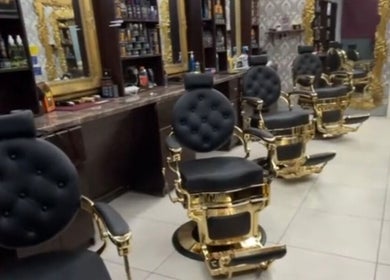 Luxurious barber chairs at Nanos Barber in Enniscorthy, County Wexford, IE, offering a premium grooming experience.