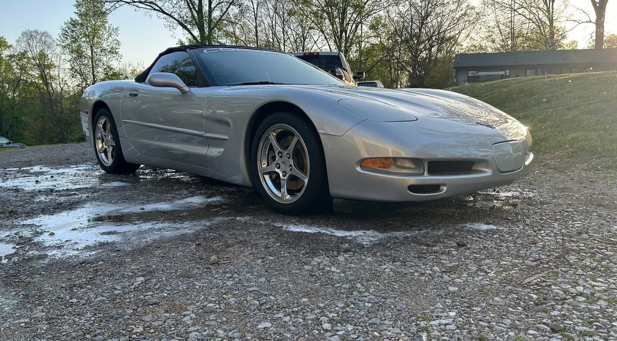 A polished silver sports car detailed by Helton's Mobile Detailing in Lenoir City, Tennessee, US.