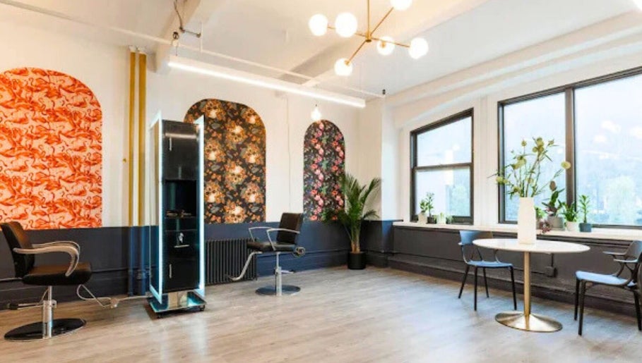 Stylish interior of Prink’d Haus salon showcasing sleek design in New York, New York, US.