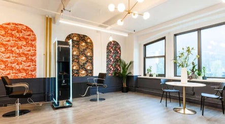 Stylish interior of Prink’d Haus salon showcasing sleek design in New York, New York, US.