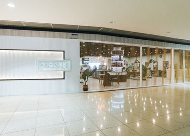 Kimage Salon's modern exterior view in Singapore, Singapore, SG showcasing its inviting glass facade.