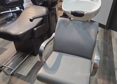 Modern washing station at Seoul Hair Salon in Calgary, Alberta, CA, highlighting comfort and style.