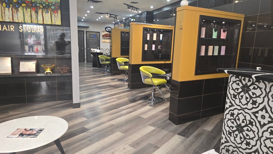 Interior of Seoul Hair salon in Calgary, Alberta, CA with modern chairs and sleek decor.