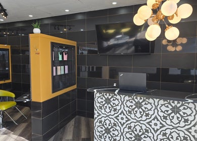 Modern interior of Seoul Hair Salon in Calgary, Alberta, CA featuring chic decor and stylish seating.