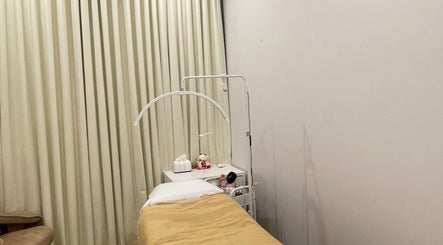 Calming treatment room at Mira's Lash Studio, Prospect, South Australia, AU with comfortable bed and soft lighting.