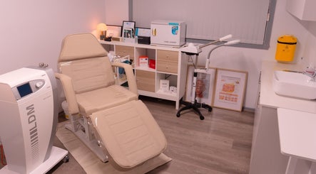 Modern treatment room at Nudia Skin Clinic, Melbourne, Victoria, AU, offering advanced skincare solutions.
