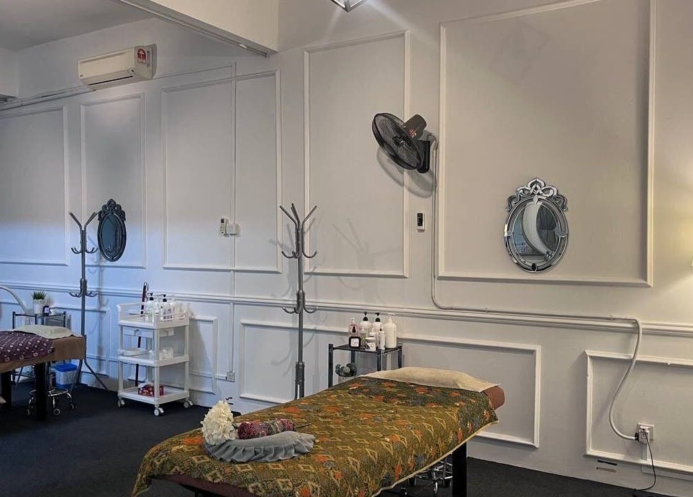 Elegant treatment room at Akma Spa Shah Alam, Selangor, MY, featuring massage tables and calming decor.